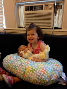 Bridget was so happy to meet her little play buddy that she refused to hand him back...