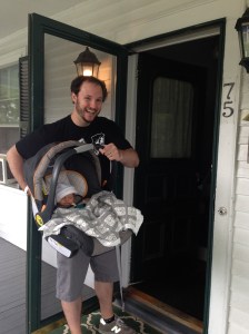 Daddy's about to carry Dermot into his house for the first time.