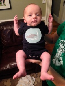 1 month photo shoot... epic fail! He is quite annoyed with Mom & Dad here.  You don't want to see the rest of the photos.