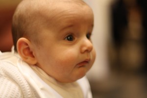 "What's that the priest is saying?"