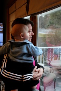 Looking at the trees and the clouds with Auntie Di.